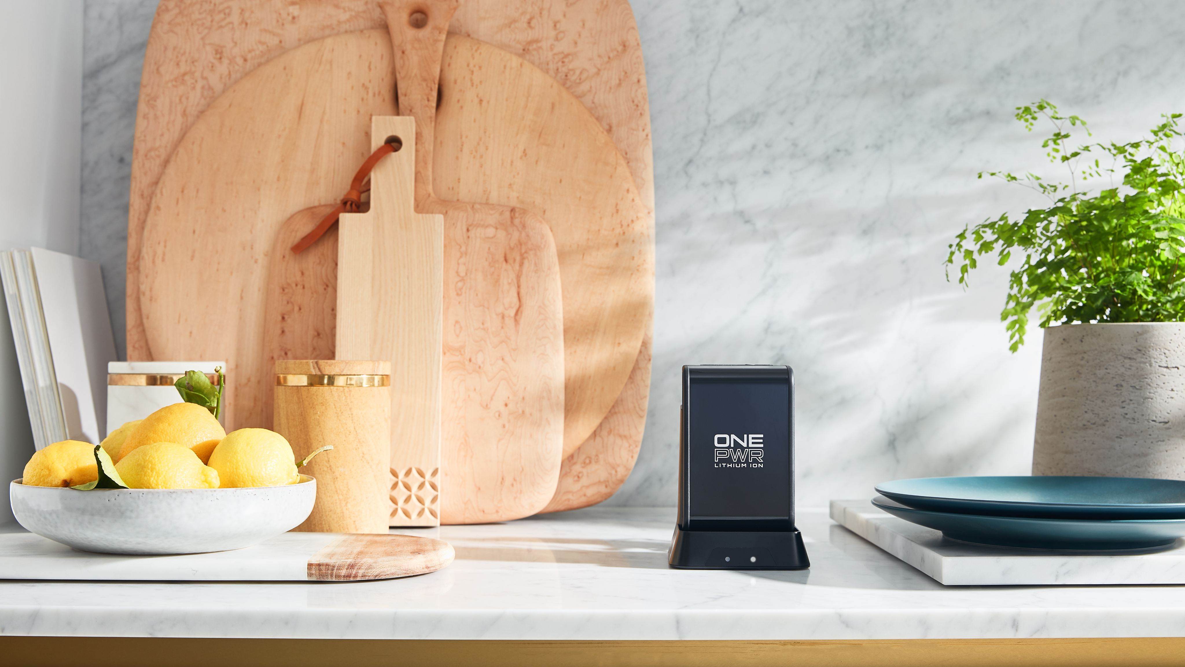 Graphic depicting a mountain peak at sunset cropped in a circle with the words RANGE CRAZY above and below.